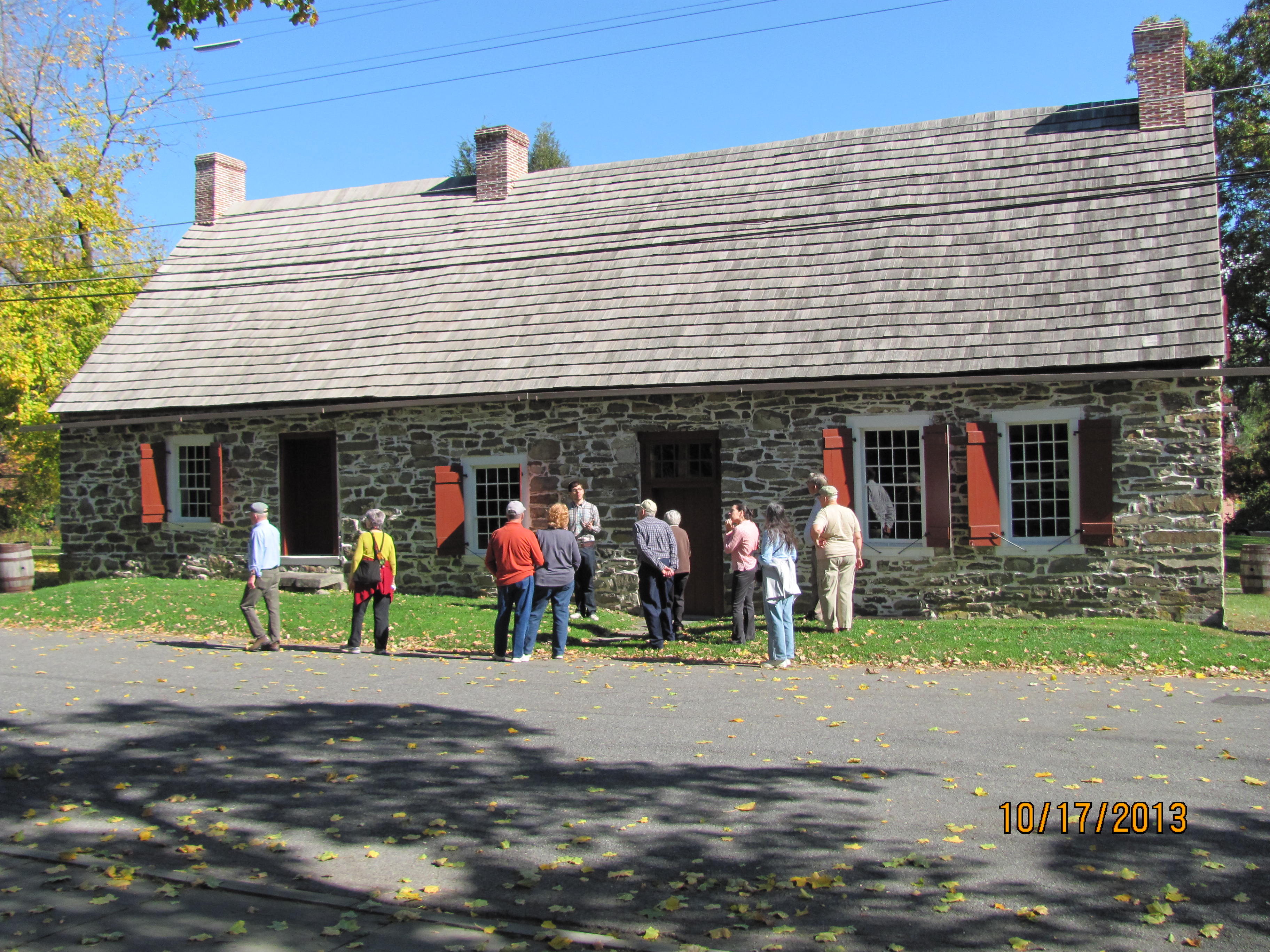 The Genealogical Society group enjoys a tour of Historic Huguenot Street