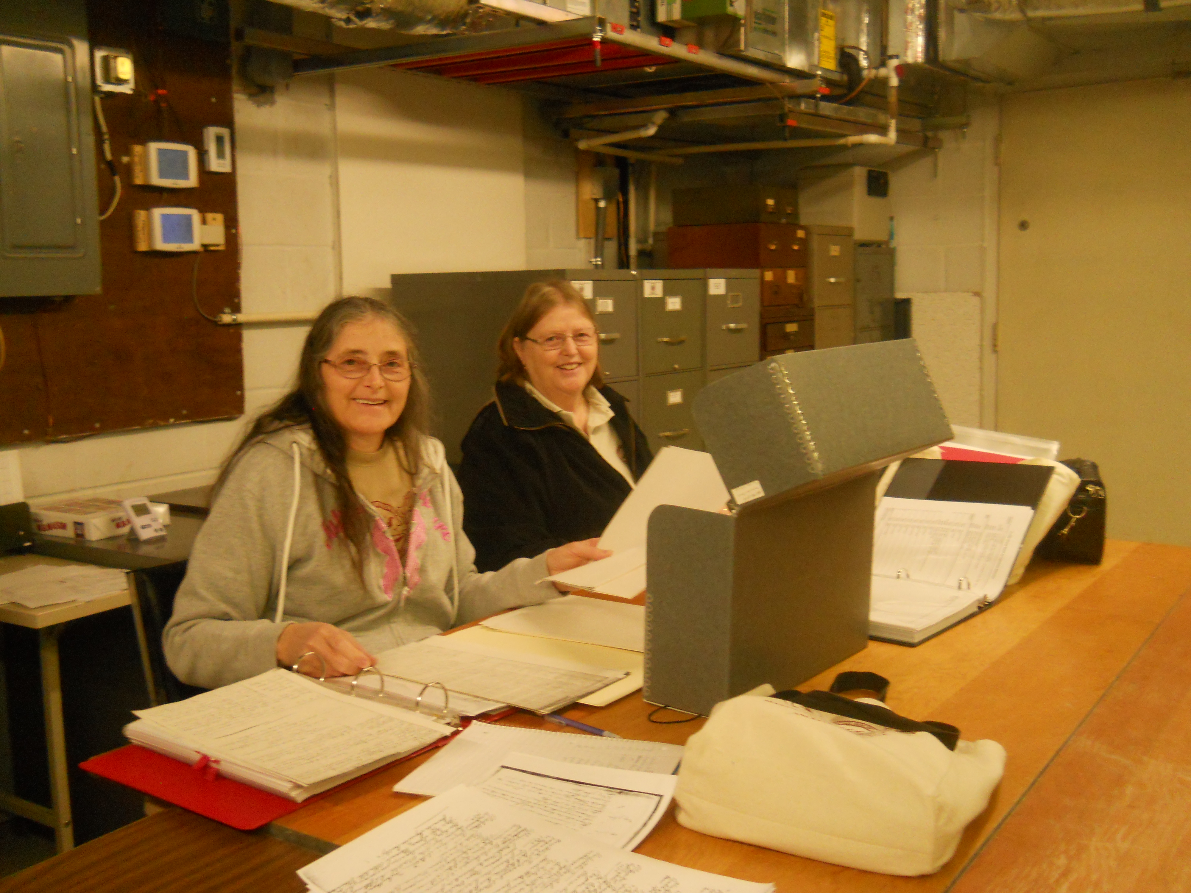 Esther and Sharon search the records of Historic Huguenot Street