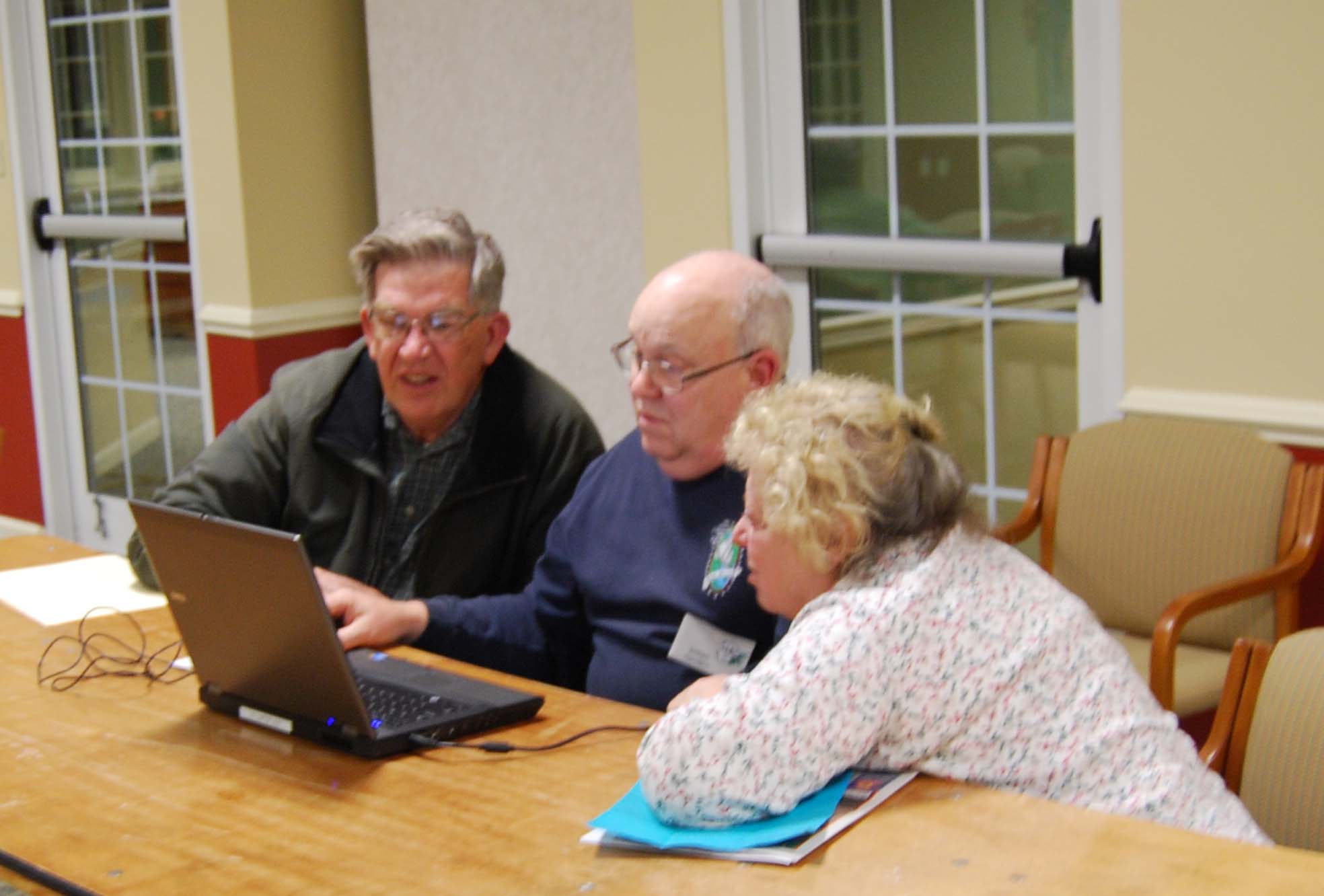 Genealogical Society members search for ancestors using internet sources such as Family Search and Ancestry